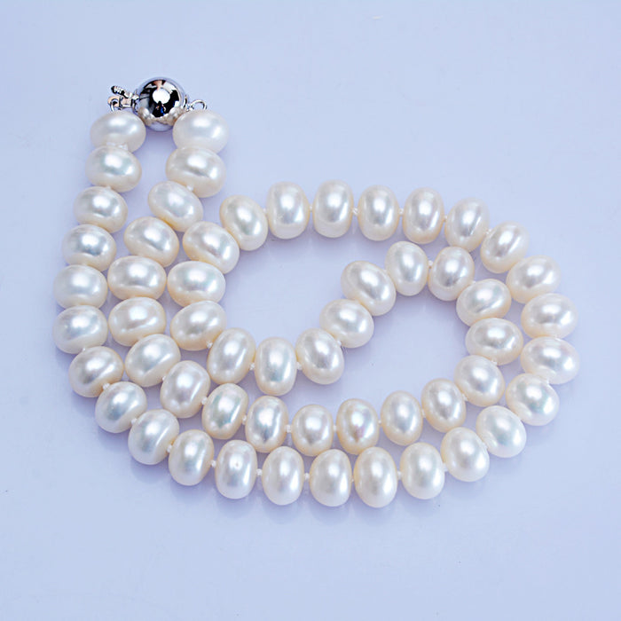 Dailan Schmuck Süßwasser Perle Halskette 10-11mm gedämpft Brot Runde starkes Licht Ball-Taste Halskette Schmuck Fabrik Großhandel