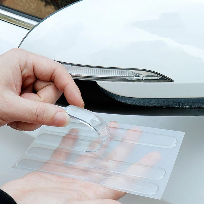 Transparent, scratch-resistant strips on the door edges